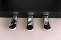 Close-up of three pedals on black piano Royalty Free Stock Photo