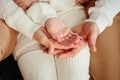 Close up of three people folding their palms