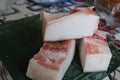 Close-up of three pieces of lard on the kitchen table