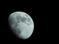 Close-up of a three-quarter moon in the night sky Royalty Free Stock Photo