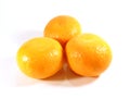 Close-up of three ripe oranges isolated on white Royalty Free Stock Photo