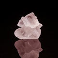 Close Up Of Three Stacked Pink Salt Flakes