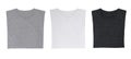 Close-up of the three t-shirts (black, white and grey). Royalty Free Stock Photo