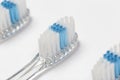 Close up of three toothbrushes
