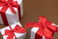 White gift box red ribbon Royalty Free Stock Photo