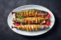 Close-up of three whole broiled hot mackerels