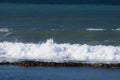 Close up of tide pool wall with waves of sea water - abstract creative background Royalty Free Stock Photo