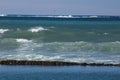 Close up of tide pool wall with waves of sea water - abstract creative background Royalty Free Stock Photo