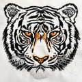 A close up of a tiger's face on a white shirt Royalty Free Stock Photo