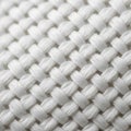 Close-up of a tightly woven textile structure, showcasing an over-under pattern. The material Royalty Free Stock Photo