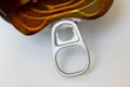 A close-up of a tinned can ring pull. Concept for convenience, fast opening and design.