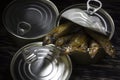 Close-up of Tinned capelin fish on wooden background Royalty Free Stock Photo