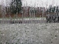 Close up of tiny raindroplets on a translucent window Royalty Free Stock Photo