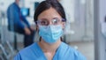 Close up of tired nurse with protection mask