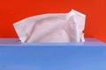 Close-up tissue box on orange background Royalty Free Stock Photo