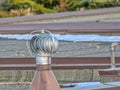 A close up to an air flow galvanized steel externally braced roof turbine vent Royalty Free Stock Photo