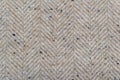 Beige wool fabric background. Amazing texture of warm textile for coats.