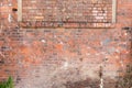 Close up to Brown color horizontal brick block grunge wall. Brick wall of red color, wide panorama of masonry. Seamless raster Royalty Free Stock Photo