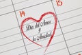 A close up to a Calendar on Feb 14 with the text on Spanish: `DÃÂ­a del Amor y la Amistad` in English Day Of Love And Friendsh