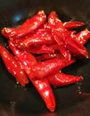 Red Chilis on Black Background Royalty Free Stock Photo