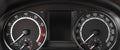 Close up to dashboard panel with tachometer and speedometer Royalty Free Stock Photo