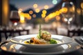 Close up to delicious gourmet dish with bokeh lights of elegant restaurant as background