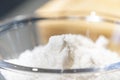 Close up to fresh sea salt in glass bowl with low light mood and tone Royalty Free Stock Photo