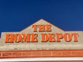 Close up to the Home Depot sign on a building during sunny day.