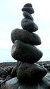 black rocks balancing in the beach Royalty Free Stock Photo