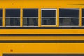 A close up to a school yellow bus.