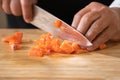 Close up to Slicing Cube Salmon by motion movement Knife by Prefessional Chef Royalty Free Stock Photo