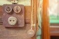 Close up to a very old light electric retro switch on on a wooden board. Vintage switch, Royalty Free Stock Photo