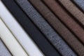 Close up to a white grey and brown colors of upholsery textured clothes Royalty Free Stock Photo