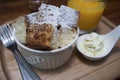 Close up toast in a cup with icing sugar powdered on top, honey in a mug shot, put on wooden plate,wooden table,morning breakfast Royalty Free Stock Photo