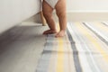 Close up toddler girl legs standing on floor Royalty Free Stock Photo