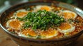 Close-up of tokyo ramen in a tradional bowl with half boiled eggs