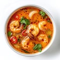 close up tom yam kung soup with shrimp in a bowl isolated on white background, top view thai prawn cuisine menu Royalty Free Stock Photo
