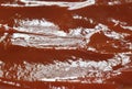 Close up of tomato sauce or ketchup spreading on plate