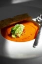 Close up tomato soup and cucumber cream