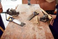 Close Up Of Tools On Workbench In Workshop Assembling Hand Built Sustainable Bamboo Bicycle Frames