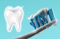 Close-up toothbrush and toothpaste with drops and blue background Royalty Free Stock Photo
