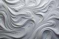 close-up of toothpaste swirls on a brushed metal surface