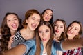 Close up top above high angle view photo beautiful she her six ladies roommates make take selfies fooling around wearing Royalty Free Stock Photo