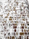Close up top above view footprints on white icy snow concrete pavement surface background. Winter walking on street Royalty Free Stock Photo
