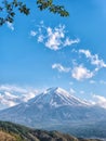 Close up top of beautiful Fuji mountain with snow cover on the top with clouds, Japan