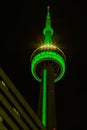 Close up top of CN tower at night. Smudgy clouds. Royalty Free Stock Photo