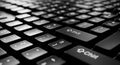 A close-up top-down view of a black computer keyboard with standard QWERTY layout focusing on the large Shift key in the center Royalty Free Stock Photo