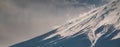 Close up top of Fuji mountain with snow cover on the top with could, fujisan Royalty Free Stock Photo