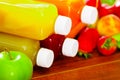 Close up top of juice bottles lying down stacked, beautiful colors and healthy concept Royalty Free Stock Photo