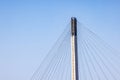 Close up top of suspension tower and cables of Bob Kerrey Pedestrian bridge in downtown Omaha